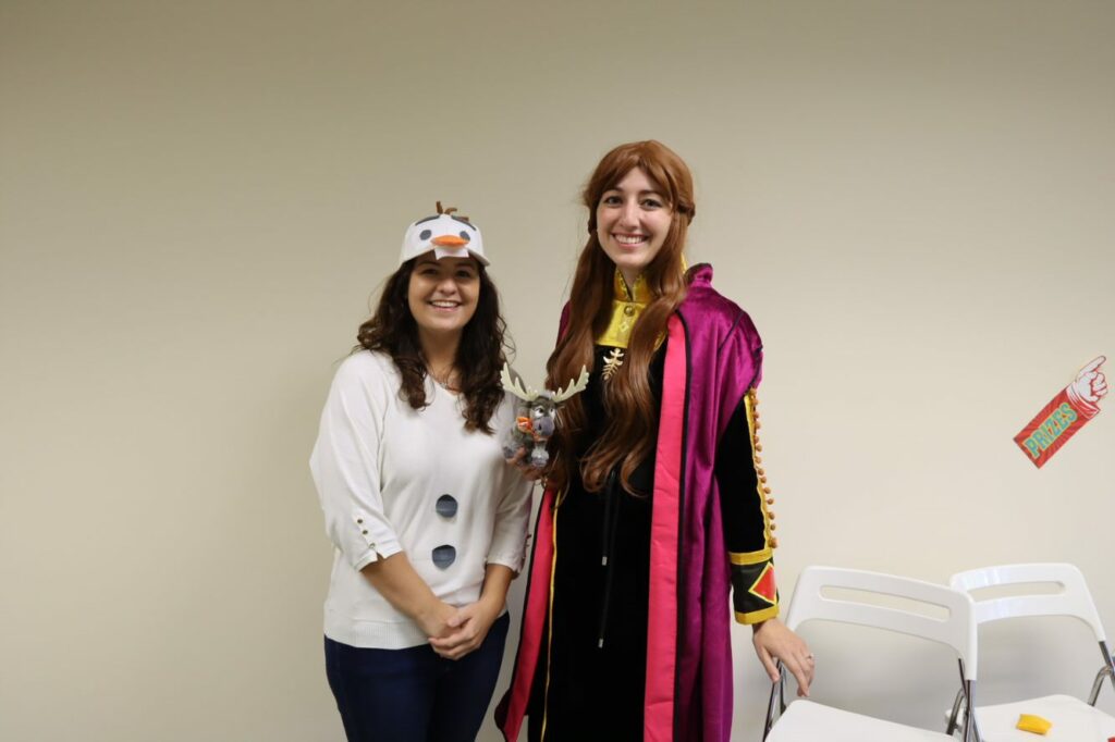 Madison Trust employees dressed up as Disney characters Olaf and Anna from Frozen to celebrate Madison Trust, Broad Financial, and Disney Day during Sprit Week.