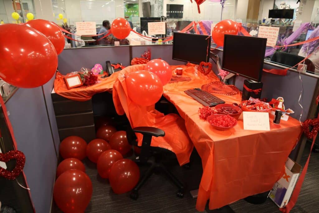 Desk decorated in red for Color Day during Spirit Week.