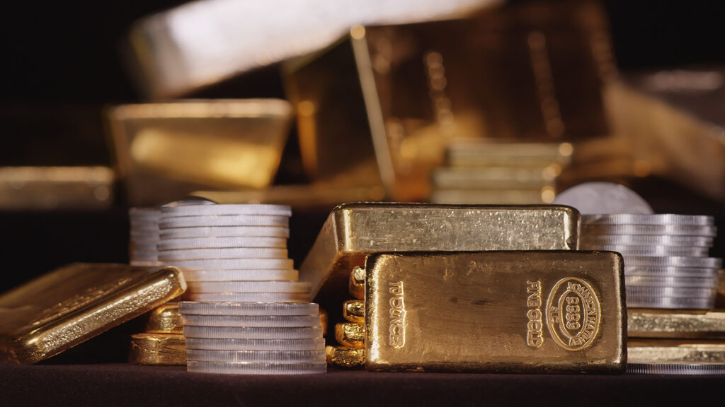 Gold and Silver Bars and Bullion sitting in a secured vault
