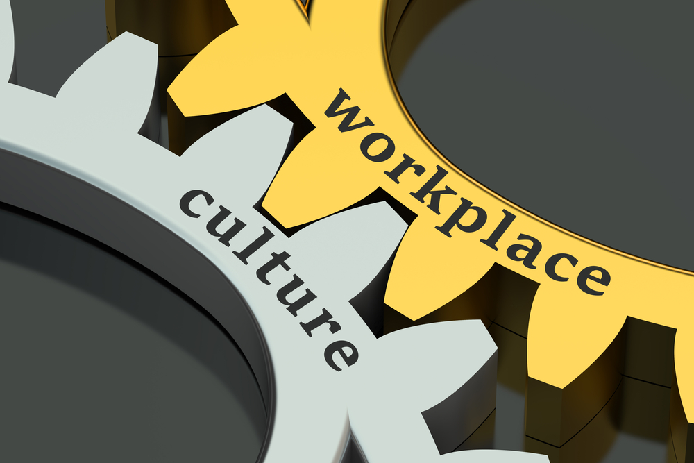 Two gears connecting that read workplace culture