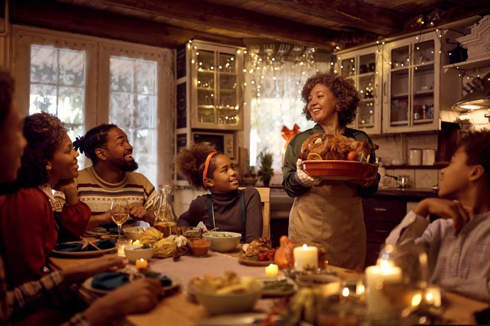 A family enjoys both Thanksgiving dinner and their decision of donating to charity through their Self-Directed IRA. 