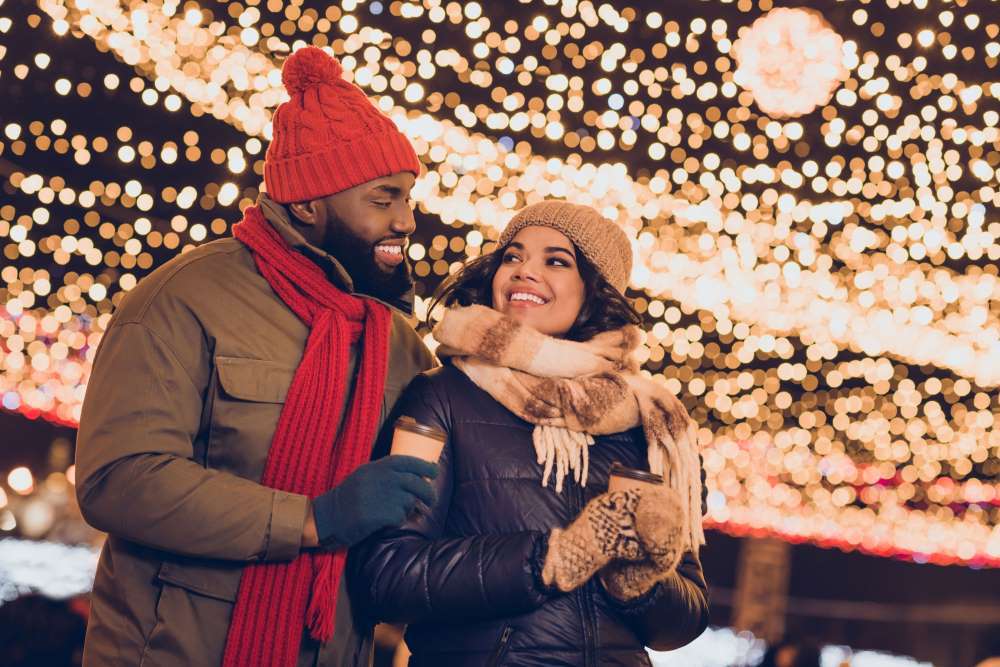 A couple enjoys a winter date night on an ice-skating rink, and compare how flowing skating is, similar to opening a Self-Directed IRA account.