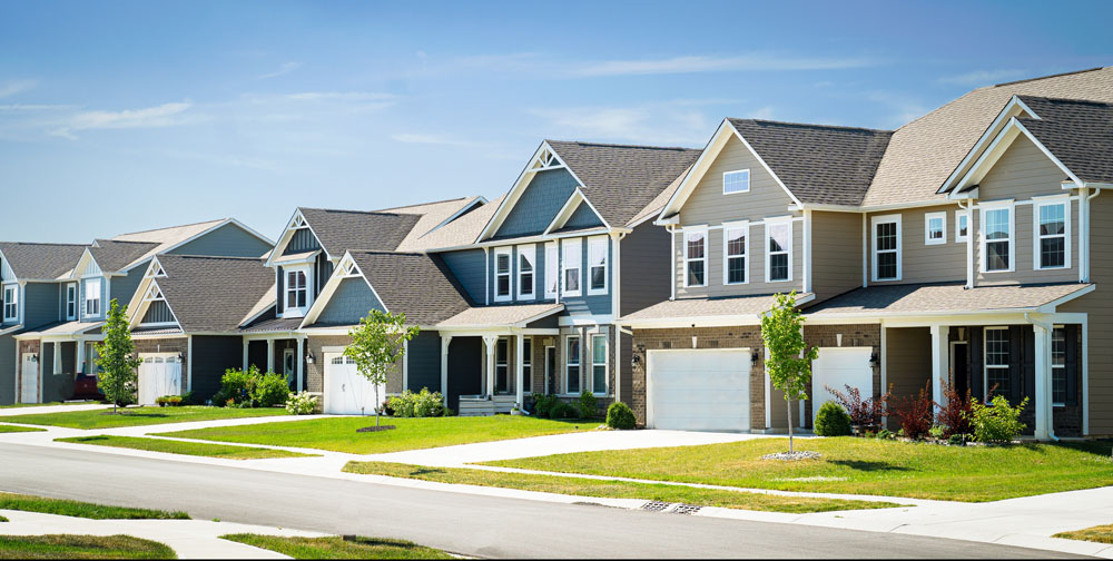 Row of houses in the Midwest to show investing in residential real estate with a Self-Directed IRA.