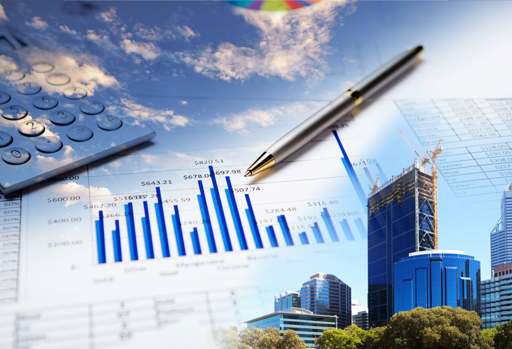 Industrial property investment in the background with a graph of investment trends in the front with a pen and a calculator to show that you can use a Self-Directed IRA to invest in industrial properties.