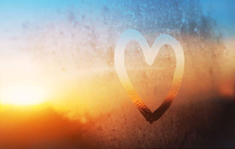 A steamy car window with a drawn-on heart, reminding us to be intentional with our actions and to think of others with our decision making.
