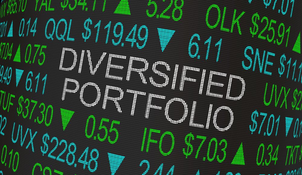 Stock market ticker with “Diversified Portfolio” centered in the middle of it to signify the importance of diversifying your portfolio with both alternative assets and Wall Street products.