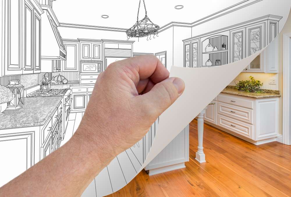 A hand peels back a drawing of a renovation plan to reveal the outcome of the refurbished room, all made possible through their Real Estate IRA.