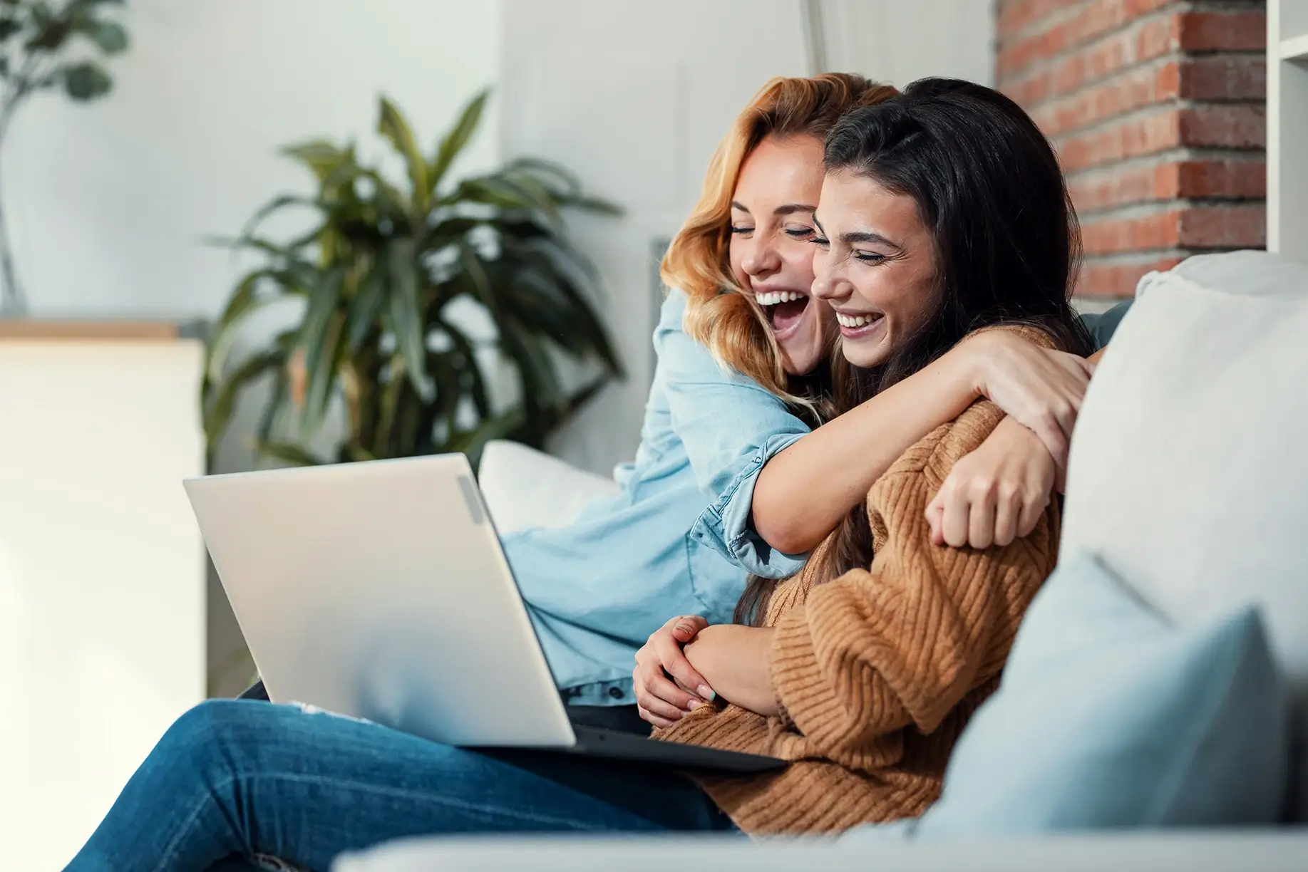 Refer a Friend Image of 2 people hugging